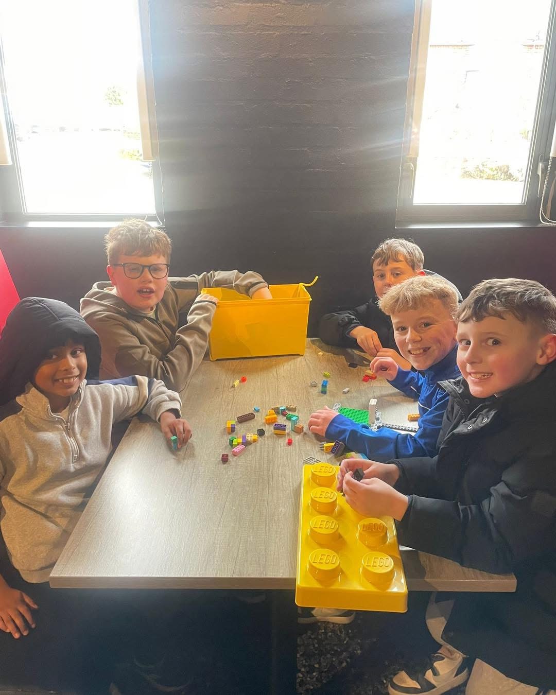 A group of people playing with lego at The Trin Centre